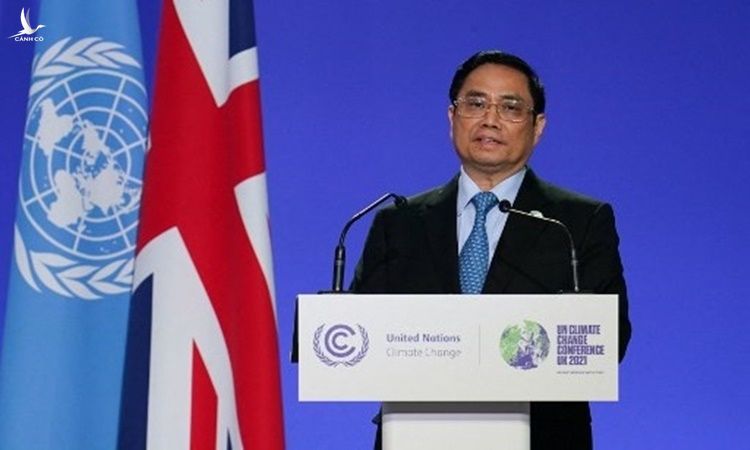 Thủ tướng Phạm Minh Chính trình bày tuyên bố quốc gia trong khuôn khổ Hội nghị Cấp cao về Biến đổi Khí hậu COP26 tại Glasgow, Scotland, ngày 1/11. Ảnh: AFP.