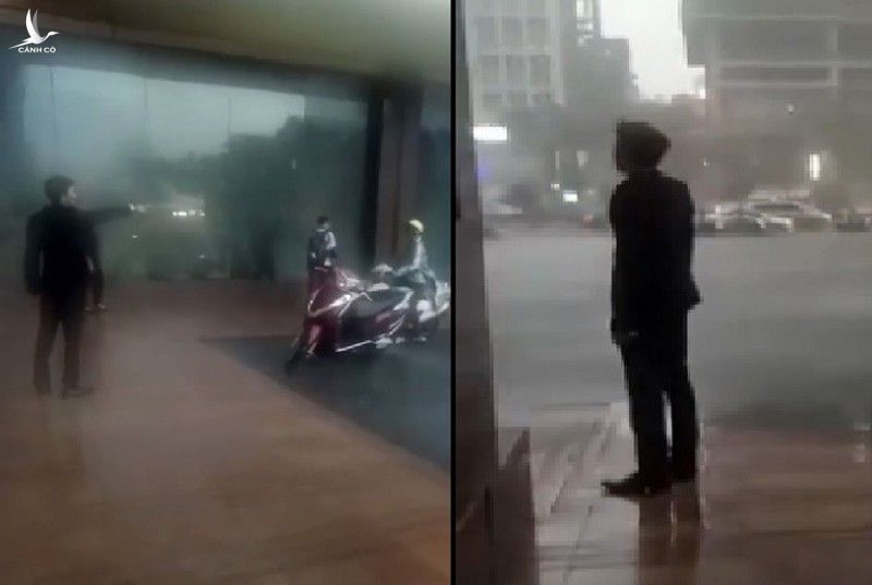 Bảo vệ khách sạn Grand Plaza Hotel đuổi phụ nữ và học sinh trú mưa