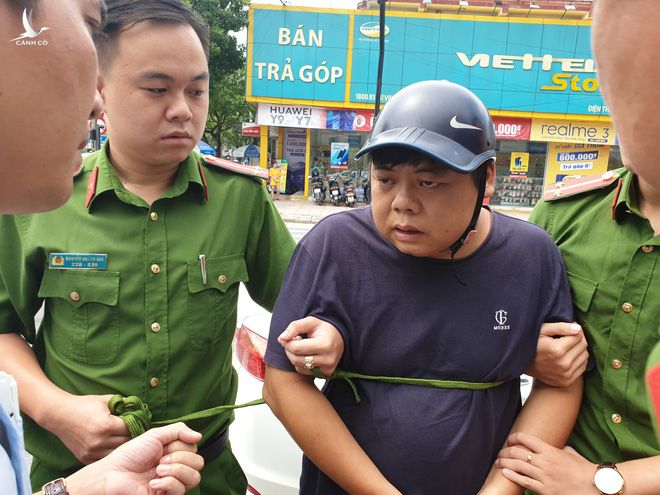 Đối tượng Yang Chang Cai bị công an bắt giữ. 