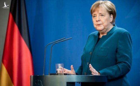 Thủ tướng Đức Angela Merkel ra tuyên bố tại Berlin hôm 22/3. Ảnh: AFP.