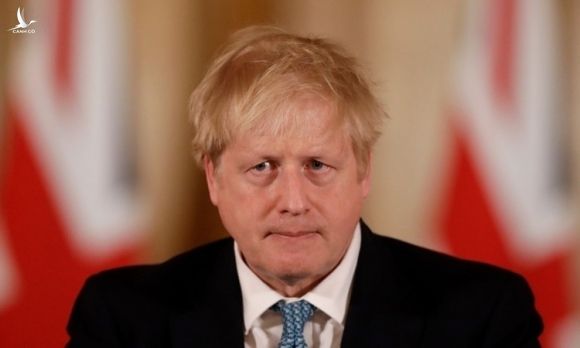 Thủ tướng Anh Boris Johnson tại cuộc họp báo ở London ngày 16/3. Ảnh: AFP.