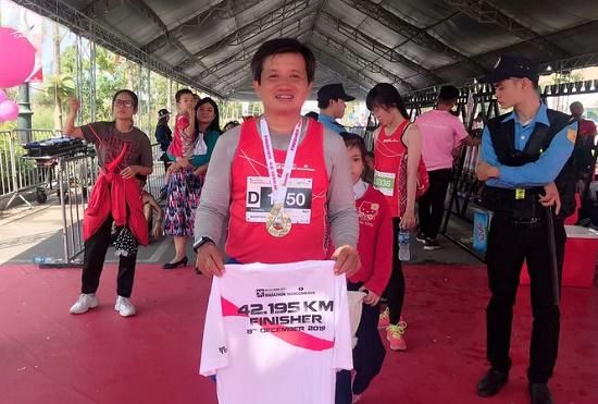 Ông Đoàn Ngọc Hải tham gia các cuộc thi chạy marathon. Ảnh: Tiền Phong