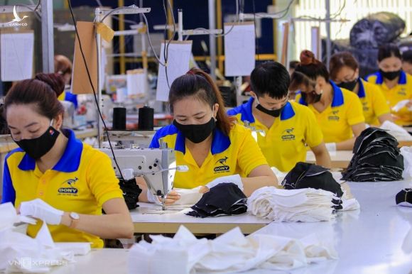 Gia công xuất khẩu hàng dệt may là một trong số ngành nghề được làm thêm tối đa 300 giờ mỗi năm. Ảnh: Nguyệt Nhi