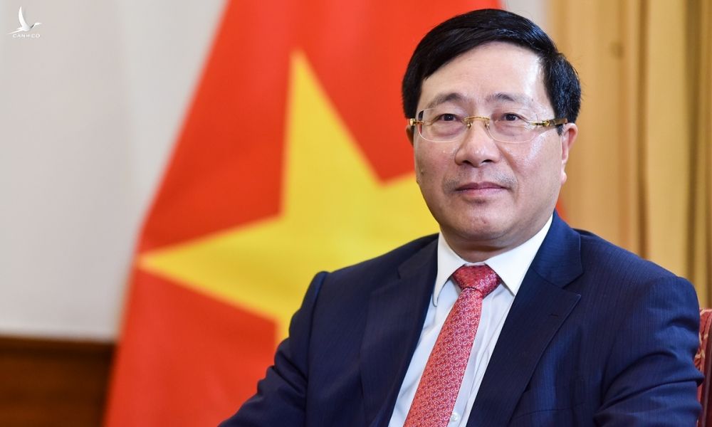 Phó thủ tướng, Bộ trưởng Ngoại giao Phạm Bình Minh trả lời báo chí ngày 24/12. Ảnh: BNG.