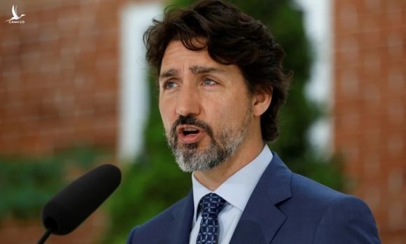 Thủ tướng Canada Justin Trudeau phát biểu tại một cuộc họp báo ở Ottawa ngày 14/12. Ảnh: Reuters.