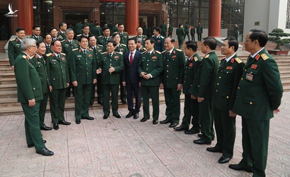 Đại tướng, Bộ trưởng Quốc phòng Ngô Xuân Lịch cùng các đại biểu dự cuộc gặp mặt. Ảnh: TTX