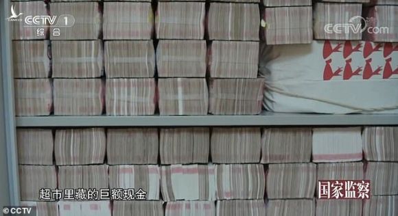 Cận cảnh nơi quan tham Trung Quốc giấu 2 tấn tiền nhận hối lộ - Ảnh 1.
