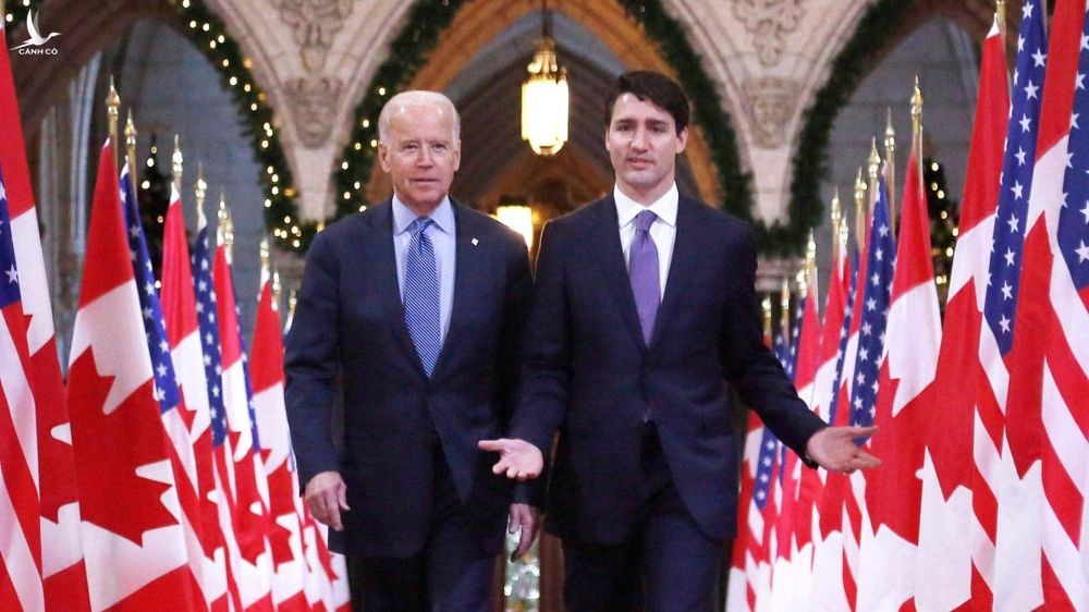 Ông Biden bắt tay với Canada để đấu với Trung Quốc - Ảnh 1.