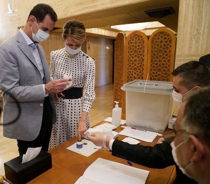 Tổng thống Assad và vợ mắc Covid-19 - Ảnh 1.