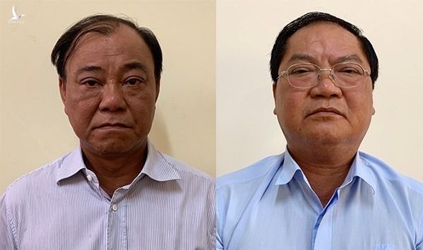 Ông Lê Tấn Hùng (trái) và Nguyễn Thành Mỹ lúc bị bắt, tháng 7/2019. Ảnh:Bộ Công an.