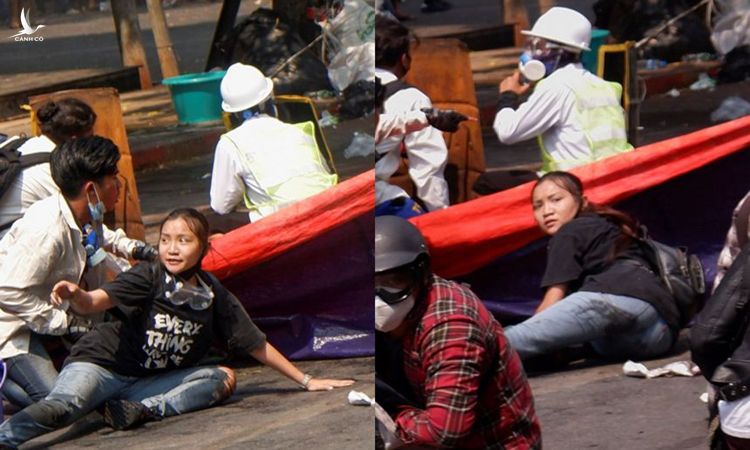 Angel tìm chỗ ẩn nấp khi cảnh sát giải tán người biểu tình ở Mandalay hôm 3/3, ngay trước khi cô bị bắn chết. Ảnh: Reuters.