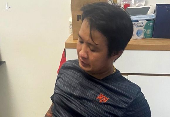 Nguyễn Vũ Anh Tuấn lúc bị bắt. Ảnh: Quốc Thắng.