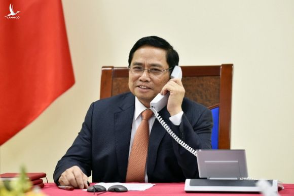 Thủ tướng Phạm Minh Chính mời Thủ tướng Singapore Lý Hiển Long thăm Việt Nam - Ảnh 1.