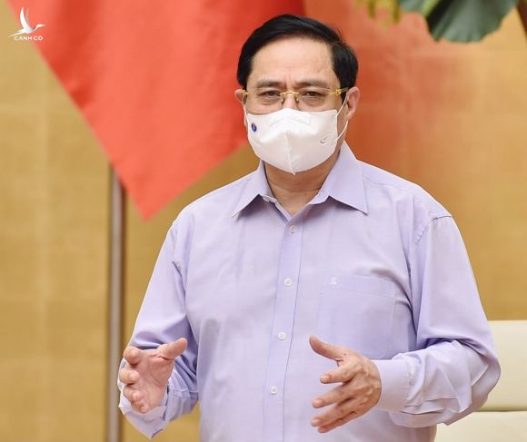 Thủ tướng Phạm Minh Chính yêu cầu quyết liệt trong triển khai chiến lược vắc xin phòng chống Covid-19 /// ẢNH: NHẬT BẮC