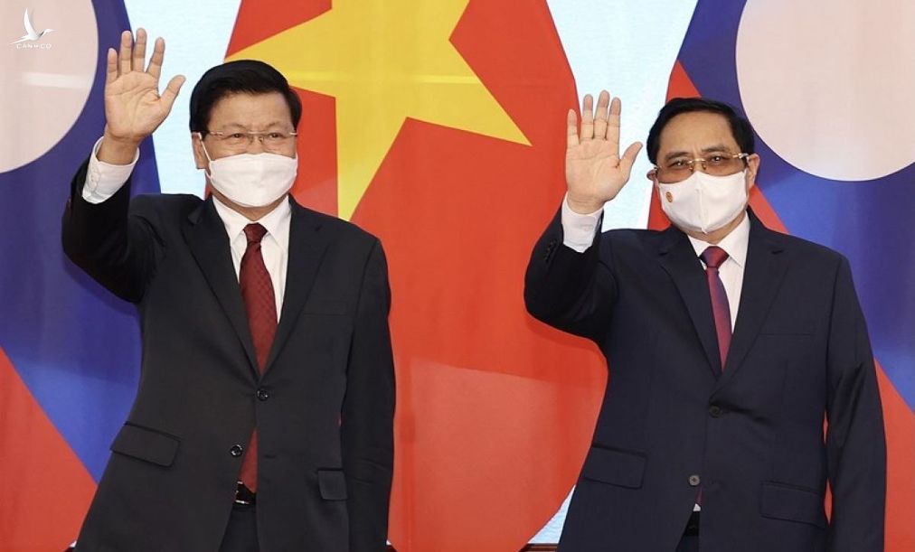 Tổng Bí thư, Chủ tịch nước Lào Thongloun Sisoulith cùng Thủ tướng Chính phủ Việt Nam Phạm Minh Chính.