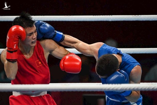 Olympic Tokyo 2020: Nguyễn Văn Đương đấm bại võ sĩ hạng 9 thế giới - Ảnh 1.