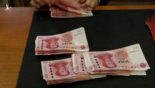 Trung Quốc khai hỏa chiến tranh tiền tệ, ‘sóng thần đang ập tới’