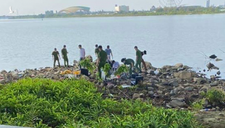 Vali chứa thi thể bị chặt thành nhiều khúc trôi trên sông Hàn
