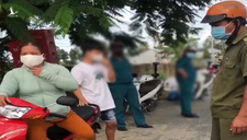 Chồng bị lập biên bản vi phạm giãn cách, vợ xông vào đánh công an viên