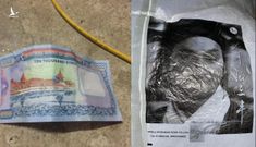 ‘Vật thể lạ’ dán hình Triển Chiêu và tiền nước ngoài rơi tại Phú Thọ