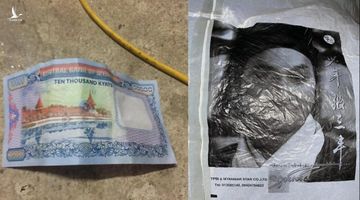 ‘Vật thể lạ’ dán hình Triển Chiêu và tiền nước ngoài rơi tại Phú Thọ
