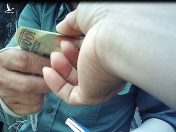 Thu phí đỗ ô tô, tiền vào túi ai? - ảnh 3
