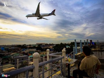 San bay Tan Son Nhat ben ngoai ket xe, ben trong ket may bay hinh anh 13 