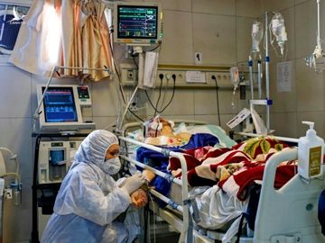 Hon 20 quan chuc nhiem virus corona, Iran doi mat tham hoa? hinh anh 1 iran_corona_1.jpg