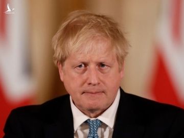 Thủ tướng Anh Boris Johnson tại cuộc họp báo ở London ngày 16/3. Ảnh: AFP.