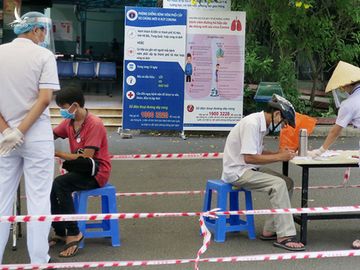 Cách ly xã hội làm phẳng đường đi của dịch - Ảnh 1. Cách ly xã hội làm phẳng đường đi của dịch - Ảnh 1.