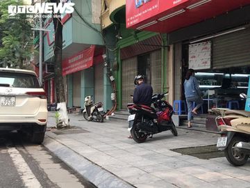 Nhiều hàng quán 'ngoài đóng, trong mở', lách luật giữa lệnh cách ly - 7