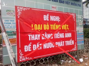 Treo băng rôn đề nghị loại bỏ tiếng Việt, 1 cựu giáo viên bị công an mời lên làm việc - Ảnh 1.