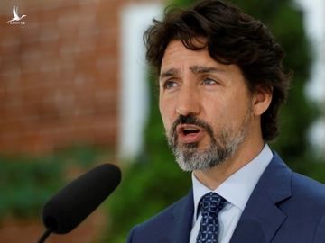 Thủ tướng Canada Justin Trudeau phát biểu tại một cuộc họp báo ở Ottawa ngày 14/12. Ảnh: Reuters.