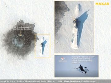 Tàu ngầm Nga xuyên thủng lớp băng ở Bắc Cực: Một đột phá lịch sử! - Ảnh 1.