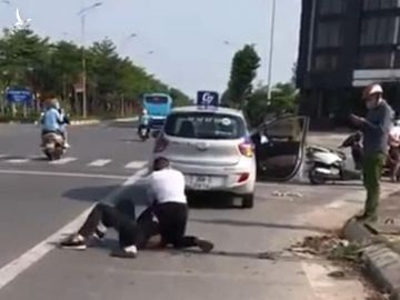 Kỷ luật đại úy công an đứng nhìn tài xế taxi bị thương vật lộn với tên cướp - Ảnh 1.