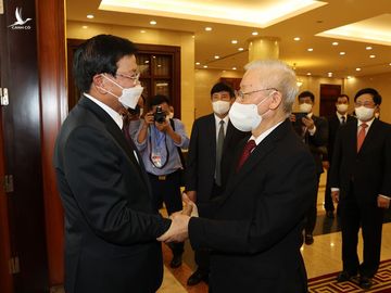 Tổng bí thư, Chủ tịch nước Lào bắt đầu thăm hữu nghị chính thức Việt Nam - Ảnh 1.
