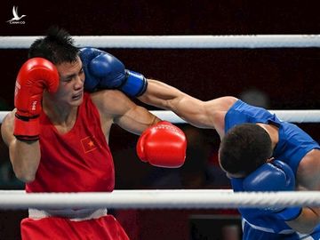 Olympic Tokyo 2020: Nguyễn Văn Đương đấm bại võ sĩ hạng 9 thế giới - Ảnh 1.