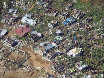 Siêu bão Rai san phẳng nhiều nơi ở Philippines, 24 người chết - 2