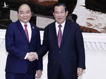 Chủ tịch nước Nguyễn Xuân Phúc và Thủ tướng Campuchia Hun Sen trong cuộc hội kiến. Ảnh: TTX