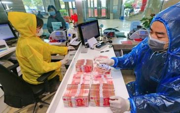 WHO khuyến cáo cẩn trọng với nguy cơ lây nhiễm corona từ tiền mặt
