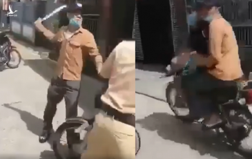 Xôn xao đoạn clip một thanh niên cầm dao uy hiếp cảnh sát giao thông